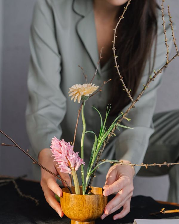 Woman feeling energized after a yoga practice, smiling lightly.